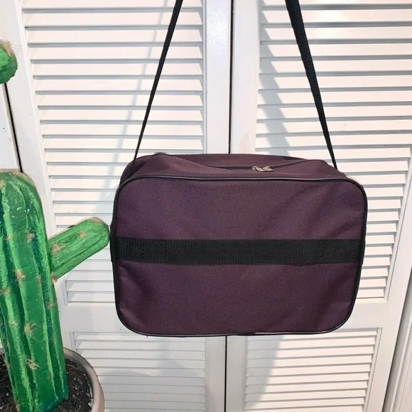 American Tourister Carry on travel bag Purple 16” X 11” X 6”